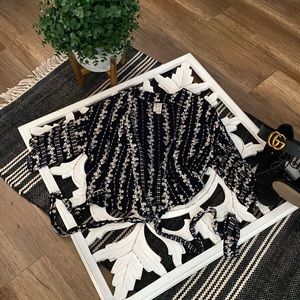 Black and cream wrap blouse. Cropped style. Size medium.